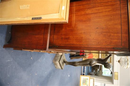 A George III Hepplewhite period mahogany dwarf linen press W. 3ft 9in. D.1ft 10in. H.5ft 6in.